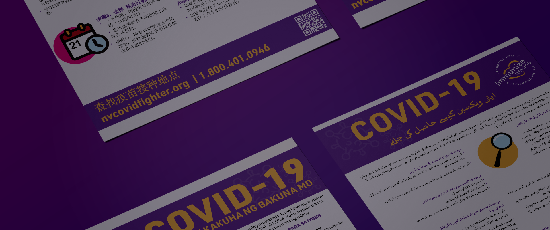 close up of COVID-19 flyers in several languages