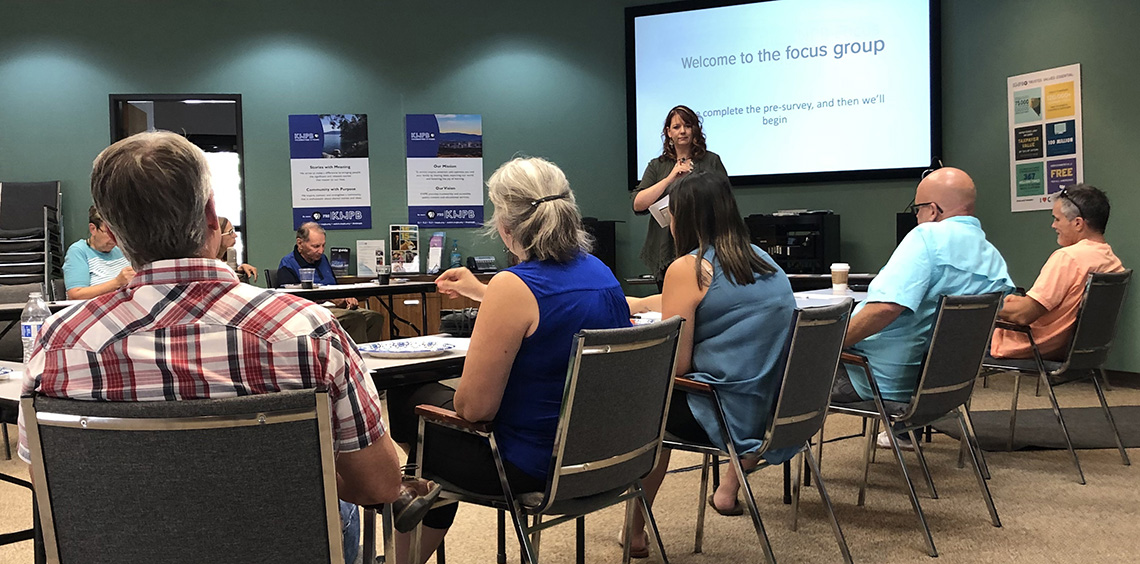 Mikalee facilitating a focus group.