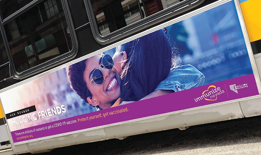 3 Million Reasons Bus advertisement featuring two women hugging