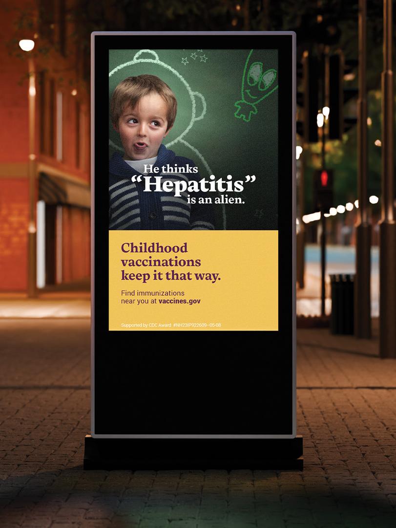 sidewalk billboard that says "he thinks hepatitis is an alien. childhood vaccinations keep it that way"