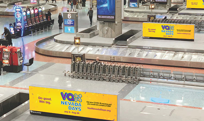 Vax Nevada Days ads at Las Vegas airport