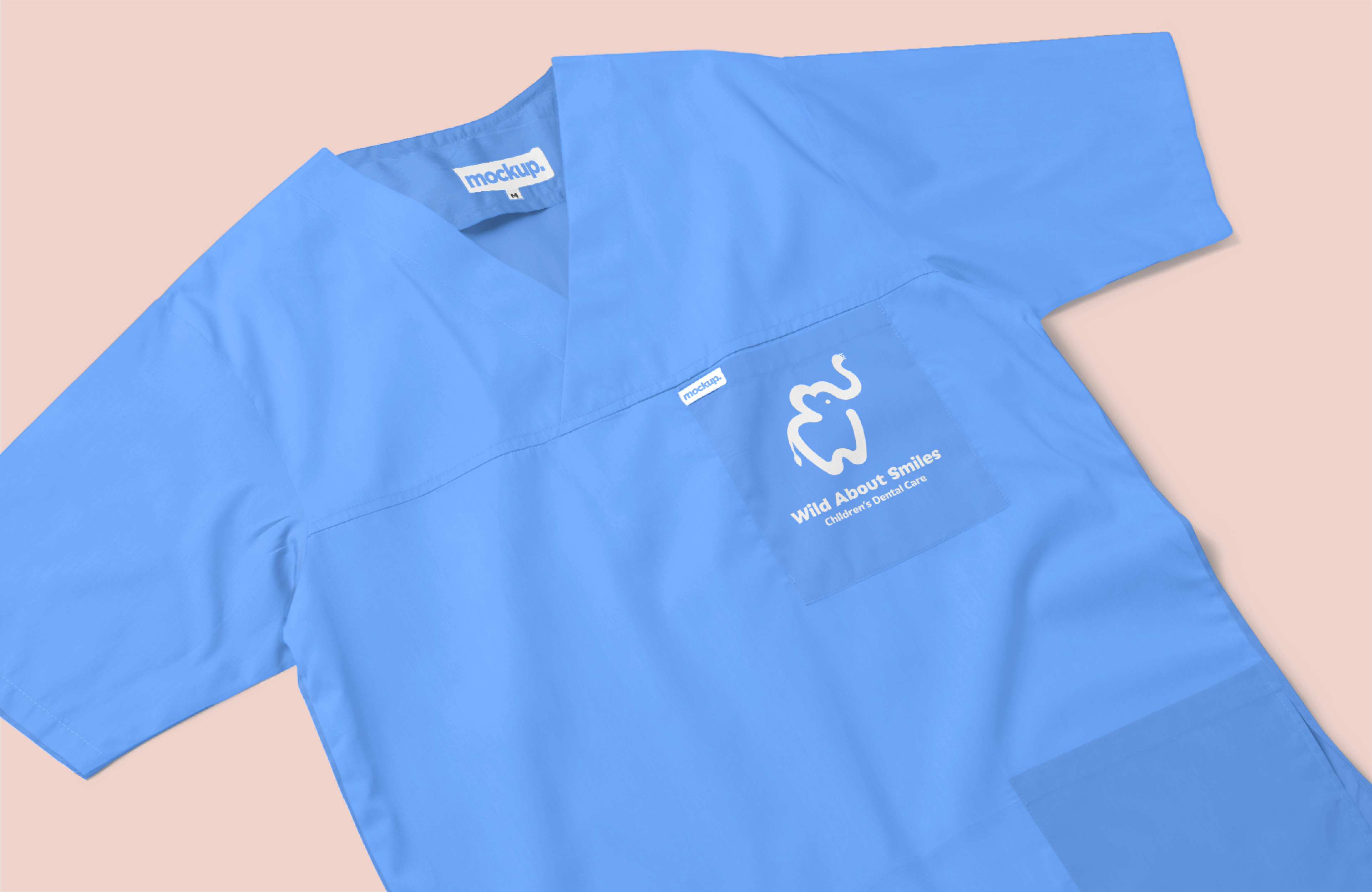 Wild About Smiles logo on scrubs